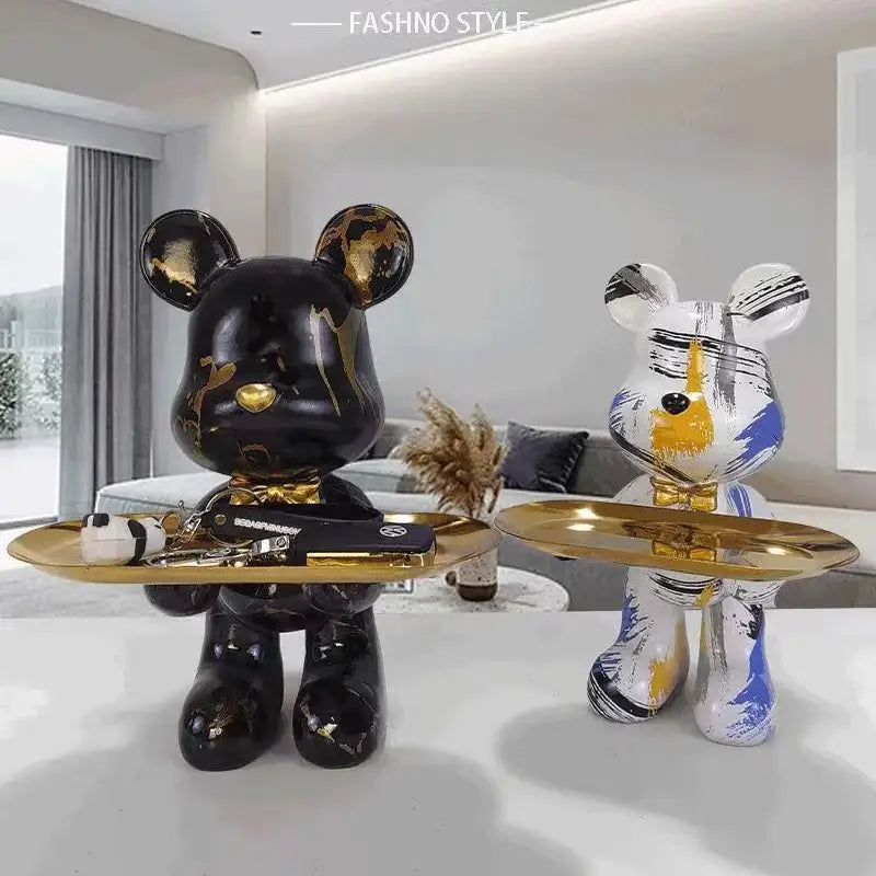 Black and gold bear figurine with glossy finish holding a golden tray british flag decorbites graffiti bear tray