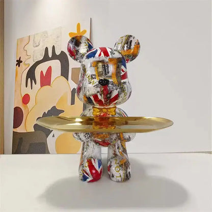 Glossy decorbites graffiti bear figurine with union jack vintage print holds golden tray as living room key tray