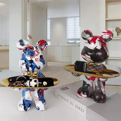 Two stylized decorbites graffiti bear figurines with metallic gold trays featuring british flag and floral design for living room key tray