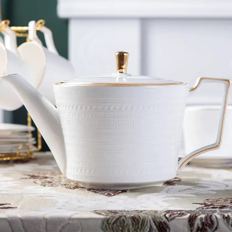 White ceramic teapot with gold trim and embossed patterns from british white tea set decorbites bone porcelain teaware