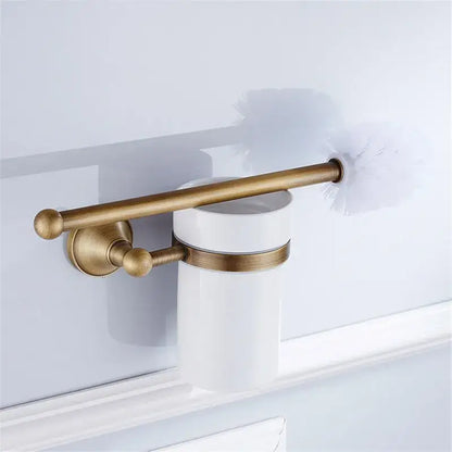 Antique brass toilet brush holder with white ceramic cup and decorative rod from decorbites bronze bathroom accessories set