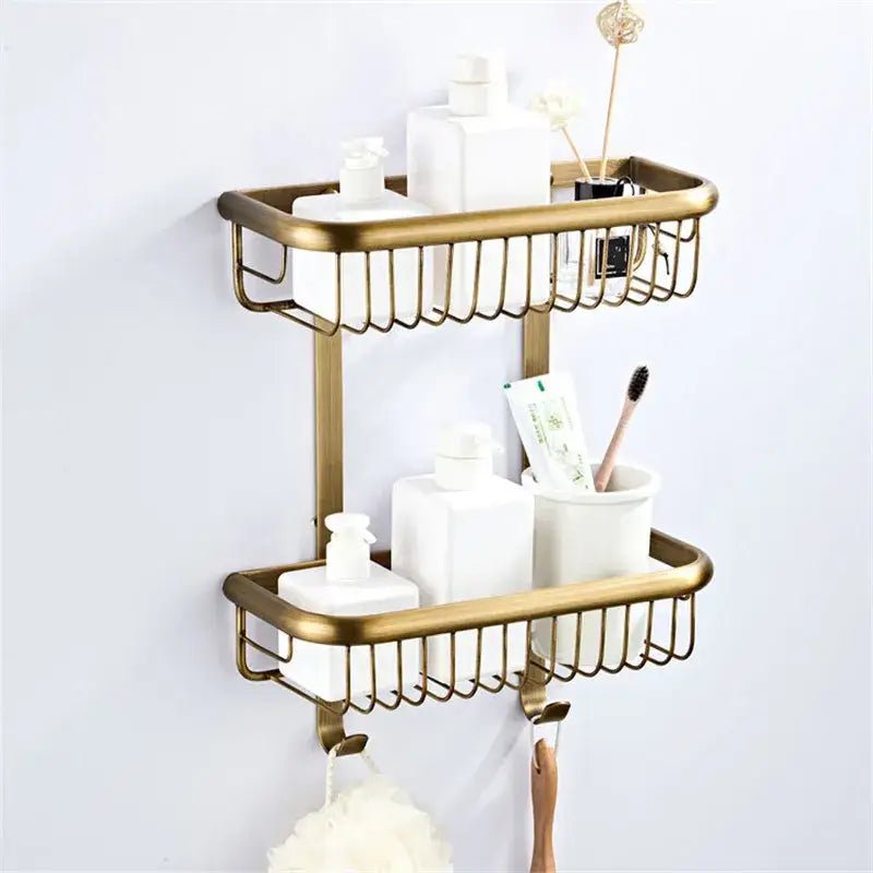Gold-toned double-tier bathroom shelf with wire mesh baskets and hooks from decorbites bronze bathroom accessories set
