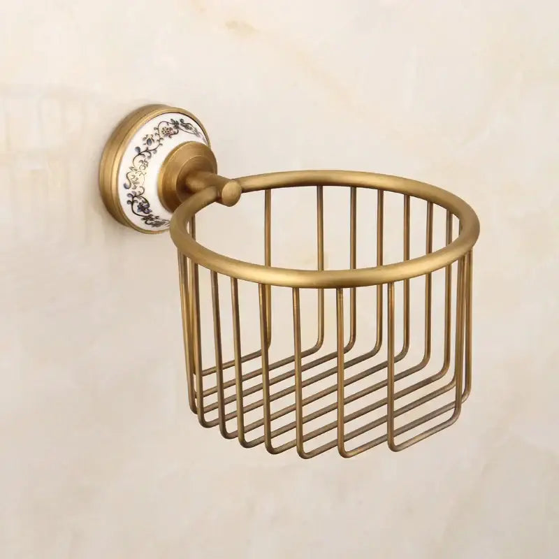 Antique brass wire mesh towel ring with decorative porcelain black floral backplate in decorbites bronze bathroom hardware set