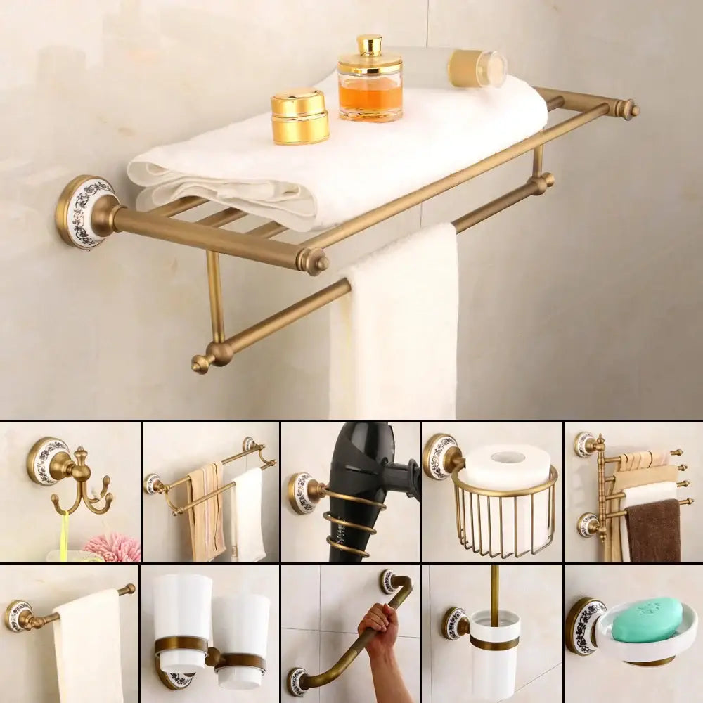 Bronze bathroom hardware set featuring a brass towel rack with decorative ceramic end caps and white towel decorbites bronze bathroom