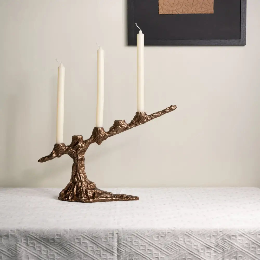 Bronze tree branch bamboo candle holder with intricate texture and three white candles for dining room decorbites bamboo candle centerpiece