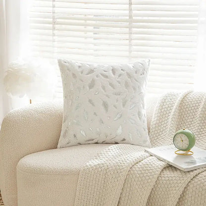White cushion with silver feather embroidery featuring bronzed feather style for elegant living room decor