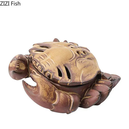 Antique-style ceramic incense burner shaped like a brown and beige crab with a gold glaze for living room aromatherapy