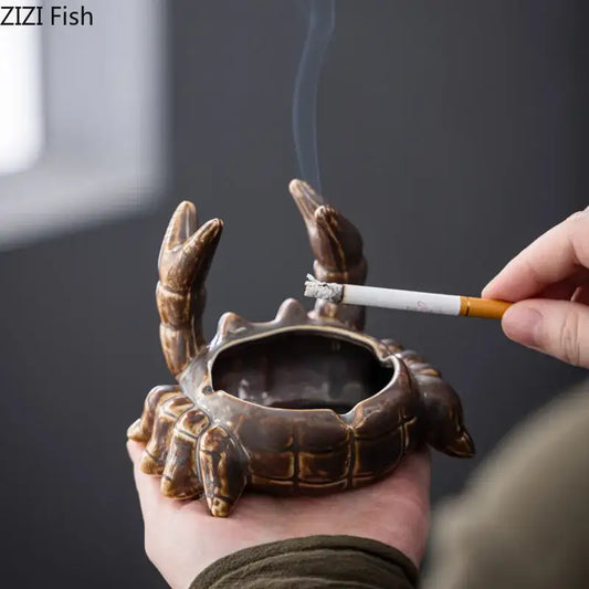 Brown crab ceramic ashtray phone holder with detailed claws and textured shell for office desk decorbites crab ceramic decor