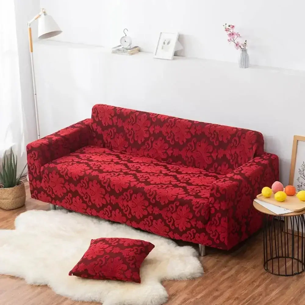 Red damask-patterned stretch sofa cover with matching pillow featuring solid embossed design for decorbites 3d solid slipcovers