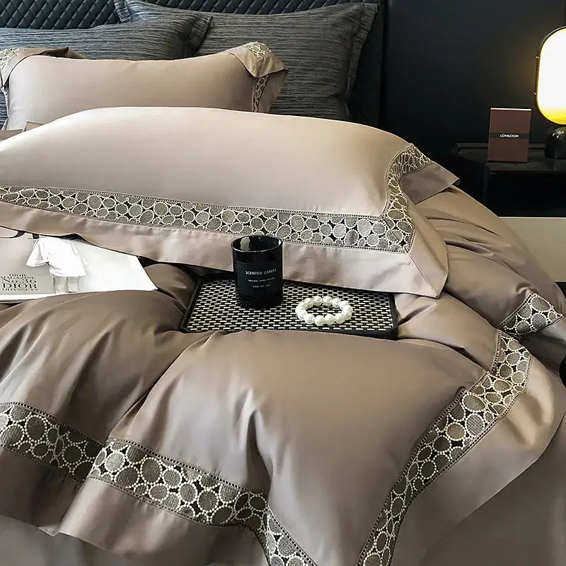 Beige satin pillowcases with intricate silver brown lace embroidery trim in decorbites brown lace bedding set