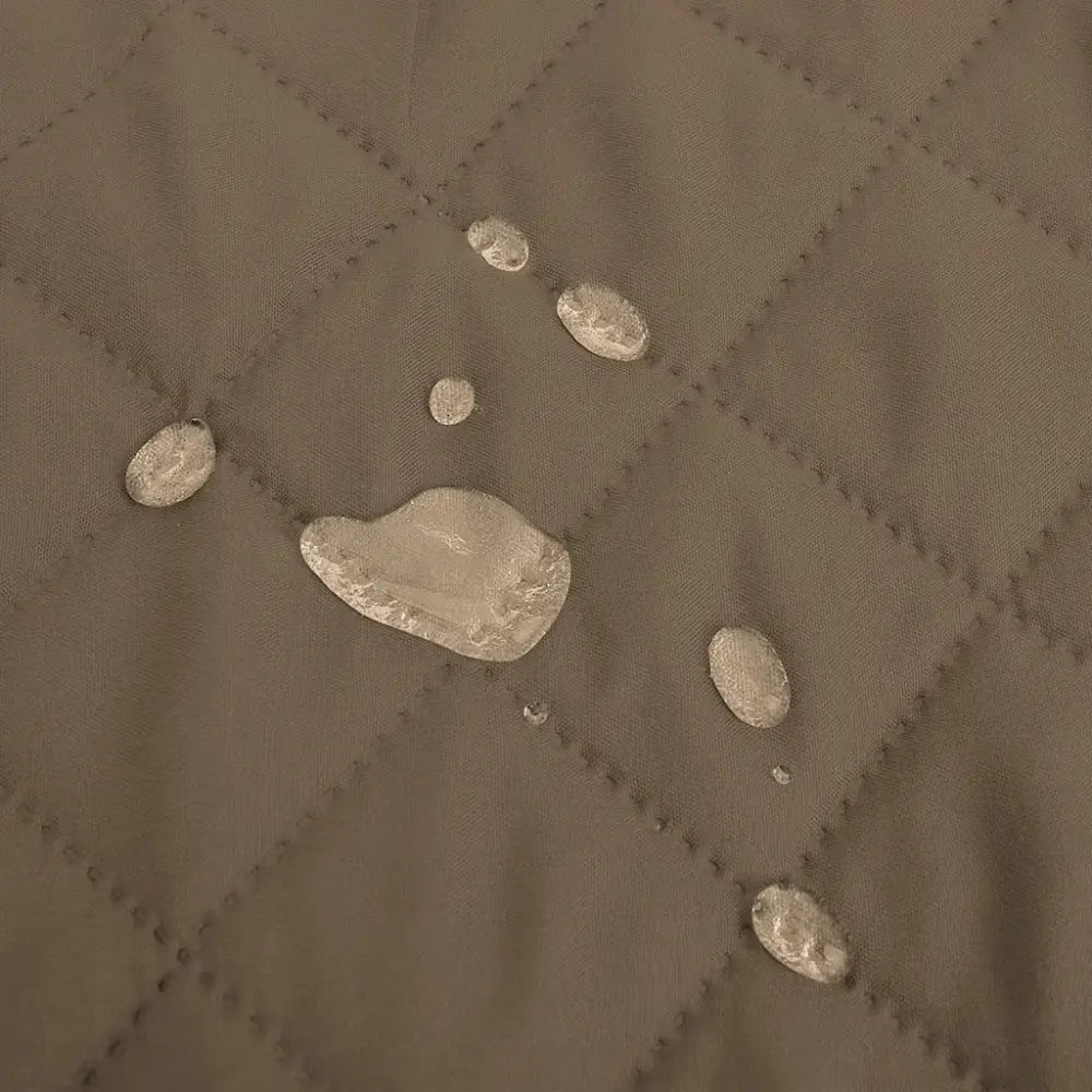 Brown quilted waterproof recliner cover with silver water droplets on gray nonslip fabric for living room protection