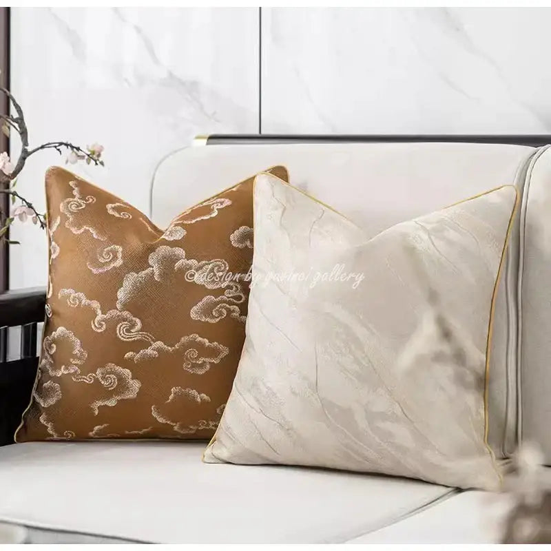 Two elegant brown and white auspicious clouds jacquard throw pillow covers with gold piping for living room decor