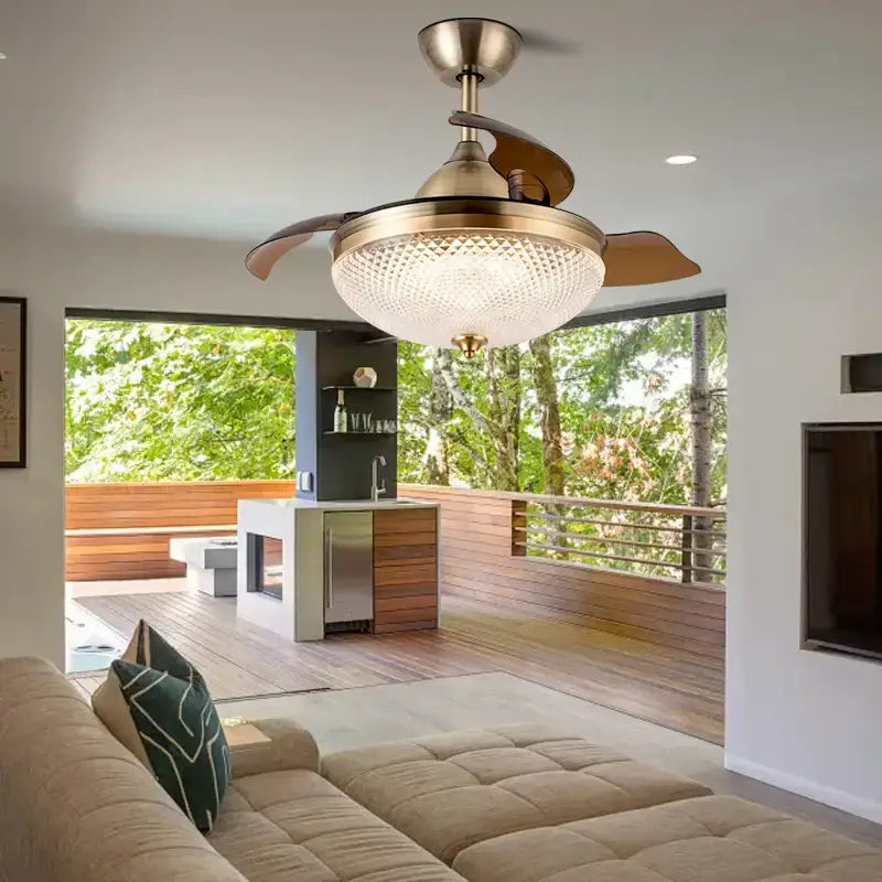 Brushed copper LED ceiling fan with remote control featuring brass finish, wooden blades, and frosted glass light fixture by Decorbites
