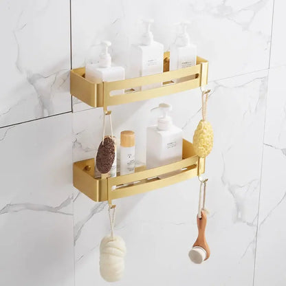 Brushed gold aluminum 2 tier corner shower shelf with hooks featuring minimalist cutouts for modern bathroom decor