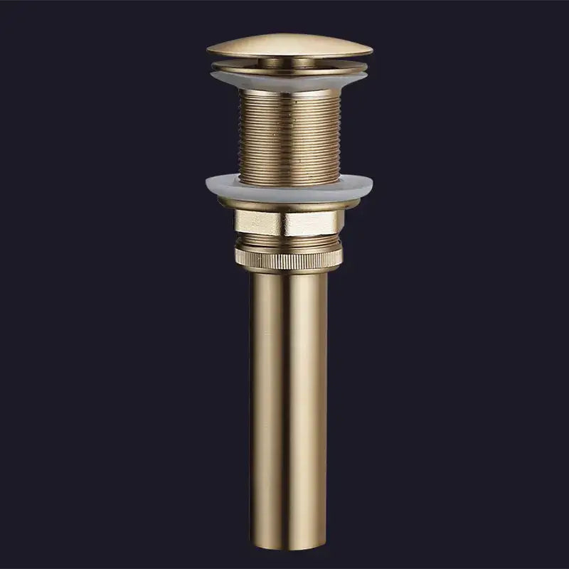Brushed gold and white ceramic bathroom sink drain assembly kit featuring a gold-toned brass drain assembly with threaded sections