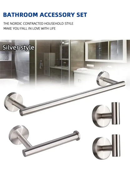 Silver stainless steel bathroom hardware set with minimalist design includes towel bar and toilet paper holder