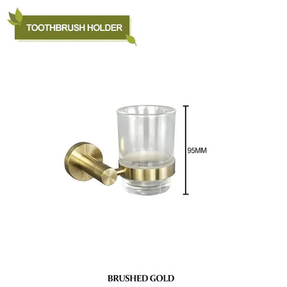 Brushed gold bathroom pendant set featuring a toothbrush holder with clear glass cup and metallic mounting bracket decorbites brushed gold