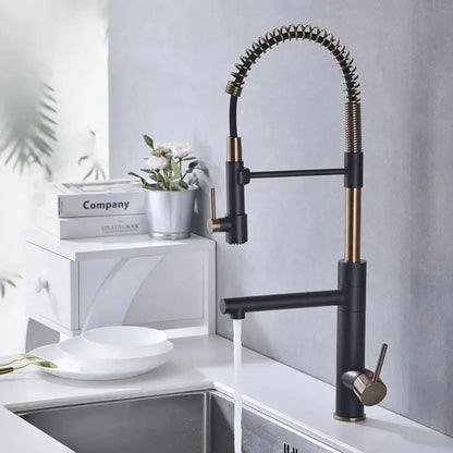 Brushed gold and black kitchen faucet with flexible coiled spring pull-down spout by decorbites brushed gold