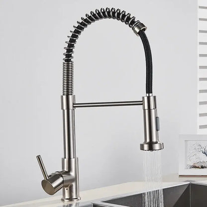 Brushed gold kitchen faucet with flexible coiled spring hose and stainless steel pull-down spray head for easy use
