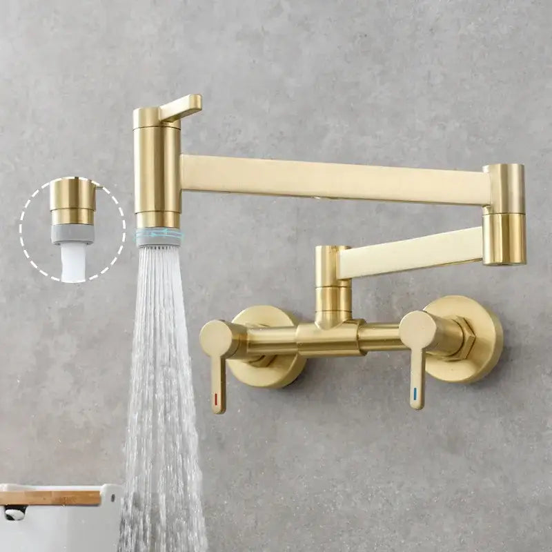 Brushed gold kitchen faucet with foldable spout and dual handles featuring a sleek metallic finish for water control