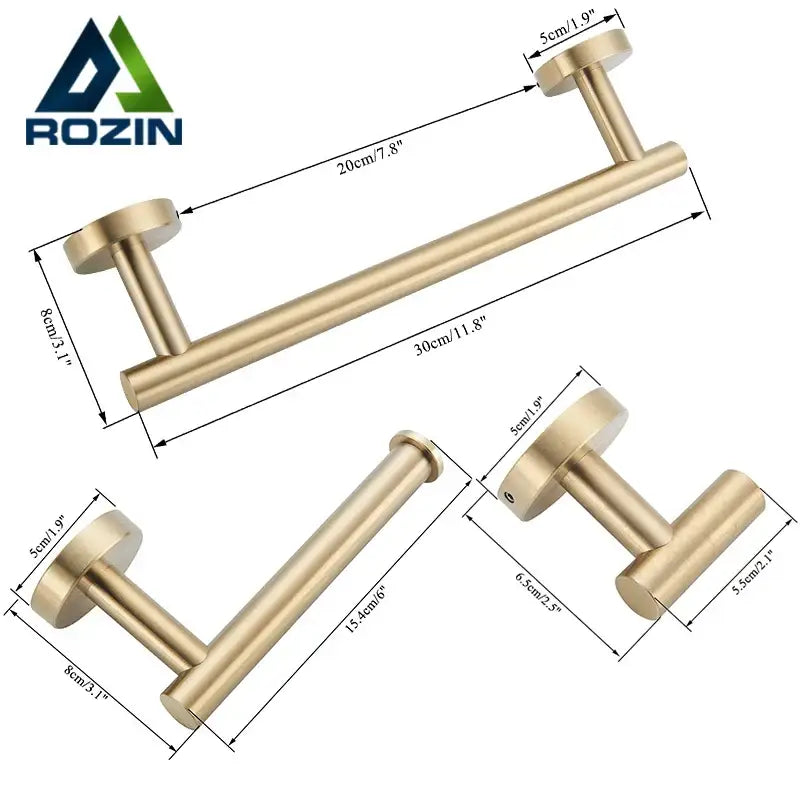 Brushed gold stainless steel towel rack with cylindrical handles in a sleek bathroom accessories set