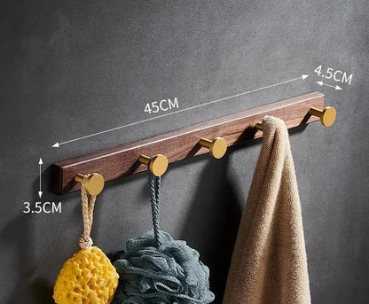 A sleek 45cm wooden robe hook towel hanger with gold-toned hooks and natural finish for bathroom use