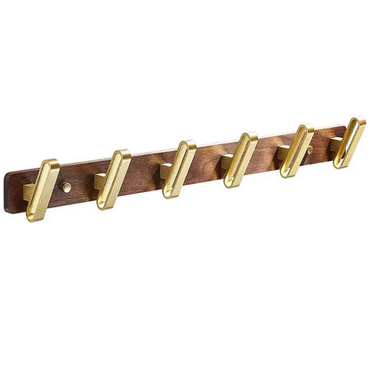 A sleek wooden robe hook towel hanger with five polished brass hooks for bathroom use