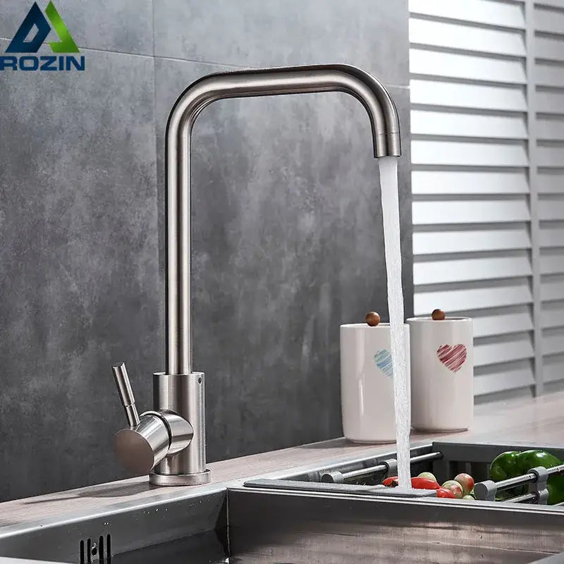 Brushed nickel kitchen faucet by decorbites with a sleek curved swivel spout and single lever handle in stainless steel