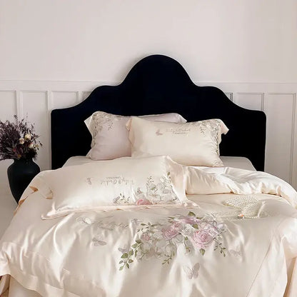 Cream-colored satin bedding set featuring delicate pink roses and butterflies with decorbites butterfly flowers embroidery