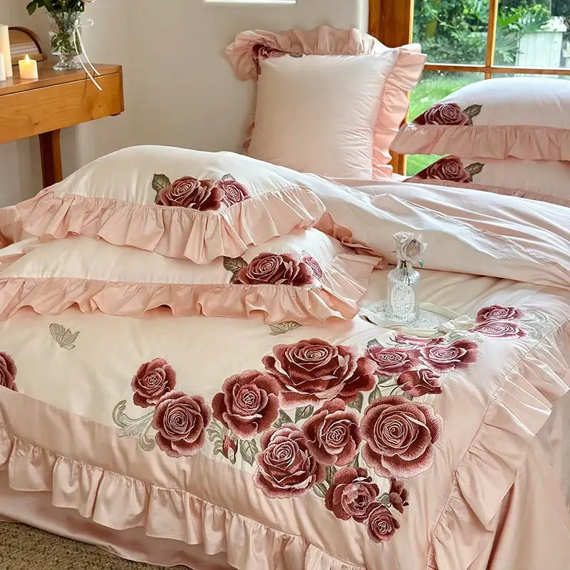 Pink satin bedding set with butterfly flowers embroidery ruffled edges and embroidered roses for elegant bedroom decorbites decor