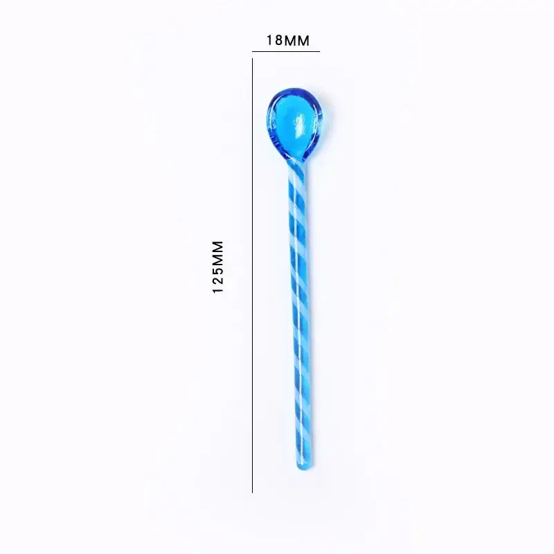 A translucent blue candy cane shaped glass stirring spoon with twisted pattern and rounded handle for decorbites colorful glass use