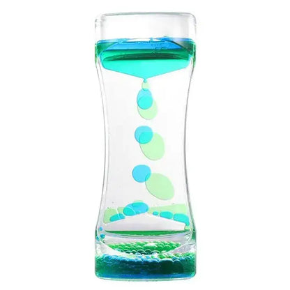 A clear glass liquid motion sand timer with swirling blue and green liquids and floating translucent bubbles for living room decor