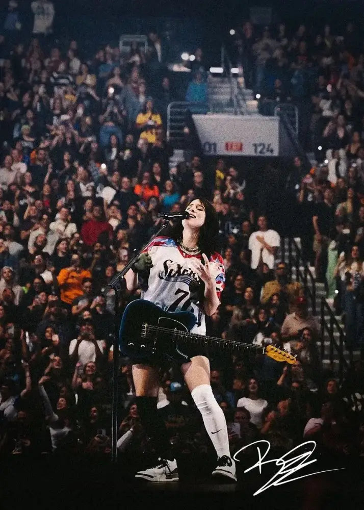 A signed canvas art print of singer b billies performing in a white and blue jersey for home decor