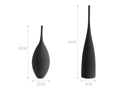 Two sleek black ceramic vases with a 32cm by 12cm and a 46cm by 9cm size from capiron zen collection for home decor