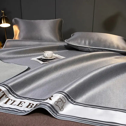 Gray satin-like carbon light cooling mat and pillowcase set with textured weave and bear embroidery for light cooling decorbites carbon light