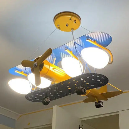 Yellow and blue cartoon aircraft ceiling fan with star-patterned wings for bedroom decorbites cartoon aircraft light fixture