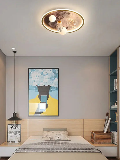 Circular ceiling lamp with cartoon astronaut, glowing orbs, and celestial patterns for kids bedroom decorbites cartoon astronaut
