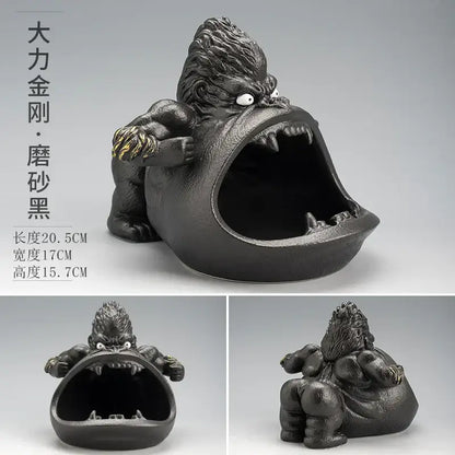 Black ceramic gorilla ceramic ashtray with gold-accented fists and white eyes for living room decorbites gorilla ceramic