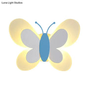 Cartoon blue and gray butterfly led wall light with glowing yellow wings designed for kindergarten use