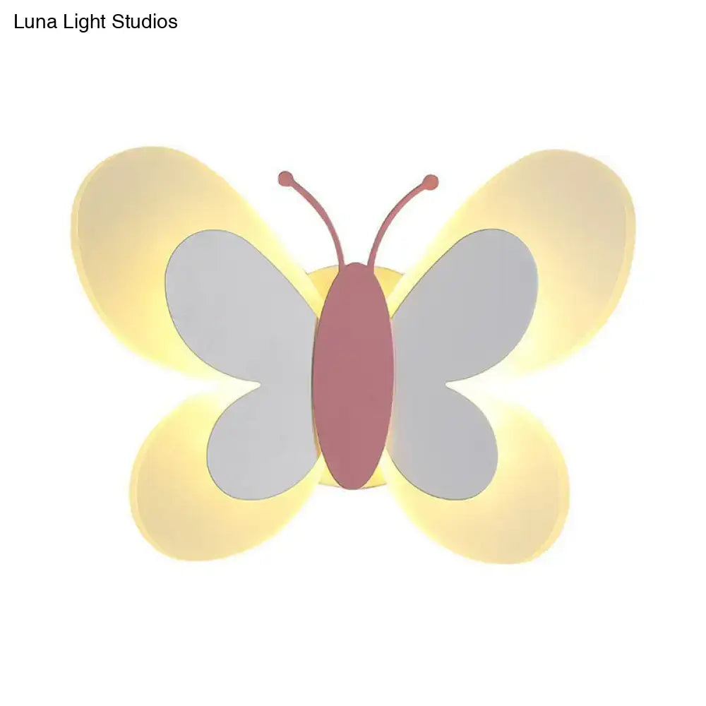 A soft yellow and gray butterfly-shaped led wall light with a pinkish-brown body for kindergarten use