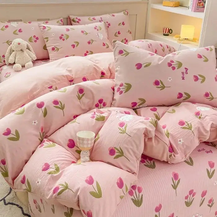 Pink cotton duvet set with cartoon cat floral design featuring soft plush fabric and pink tulip pattern with green stems