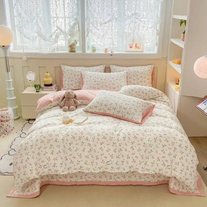 Pink and white cotton duvet set with cartoon cat floral pattern and ruffled edges for bedroom bedding