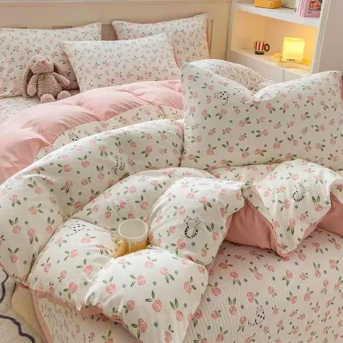 Pink and white cotton duvet set with cartoon cat floral pattern and soft cozy texture for bedroom bedding