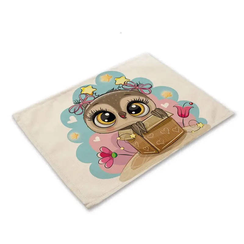 Beige fabric dining table placemat with decorbites cute owl holding book surrounded by stars and flowers set of 6