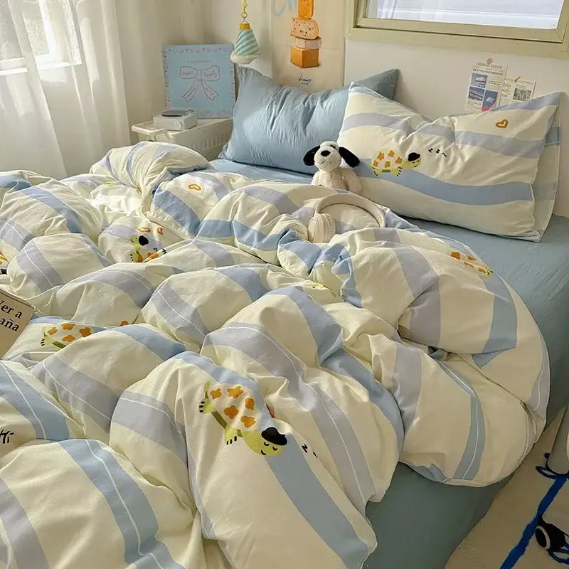 Soft blue and cream striped cotton duvet with cartoon turtle appliqués paired with fitted sheet set for bedroom bedding