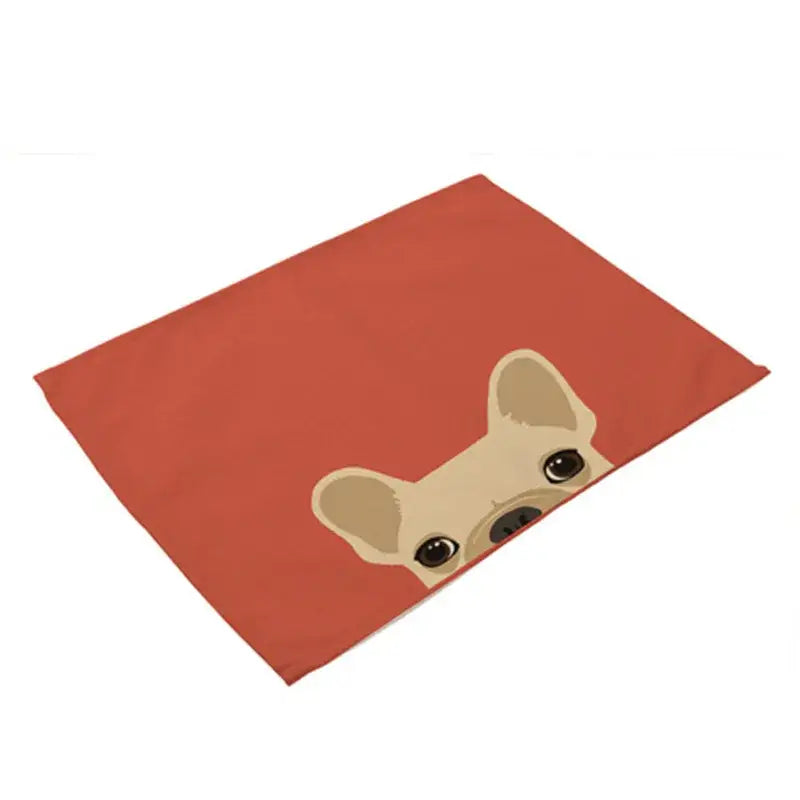 A set of four terracotta cotton linen dining table mats featuring a cartoon light beige french bulldog design