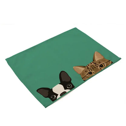 Teal cotton linen dining table mats featuring a cartoon boston terrier and brown tabby cat for dining tables