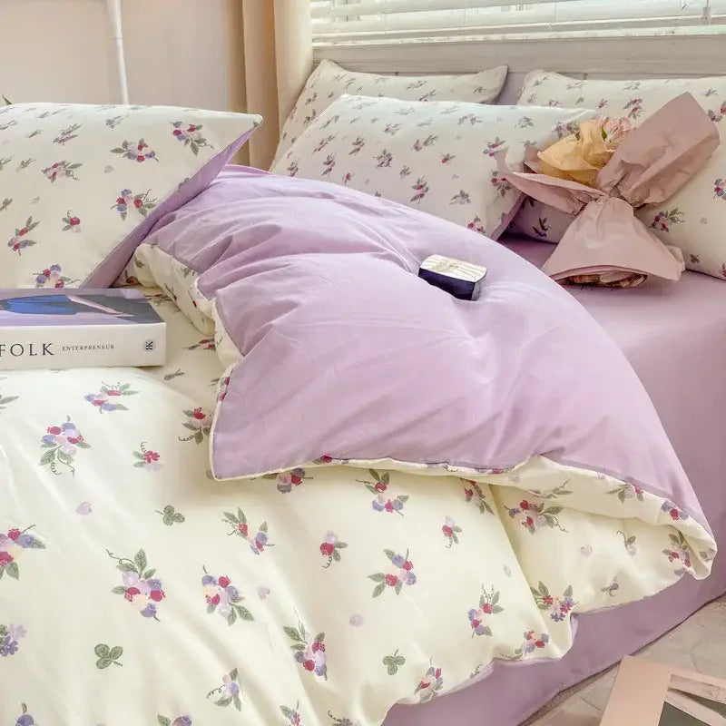 Lavender floral print duvet set with cream pillowcases featuring cartoon heart floral berry and leaf motifs for bedroom bedding