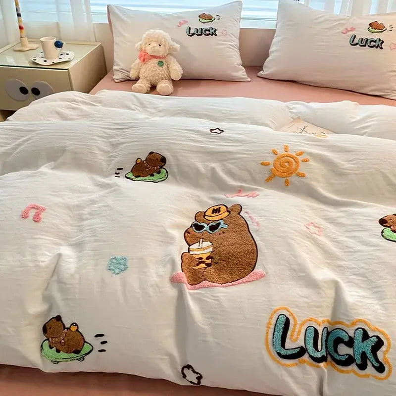 Cream white duvet cover with embroidered brown bear cartoon pattern sun motifs and colorful luck lettering bedding sets decorbites cartoon pattern