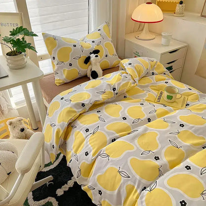 Yellow and white pear patterned bedding set with black floral accents in decorbites cartoon printed bedding sets for bedroom use